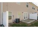 A fenced backyard featuring a patio and an air conditioning unit on the side of the home at 2555 Flat Shoals Road Rd # 1104, College Park, GA 30349
