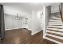 Bright living room featuring hardwood floors, fresh paint and a staircase at 500 Gardenia Ln, Marietta, GA 30068