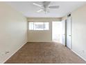 A well-lit, neutral bedroom provides a clean and comfortable living space at 346 Carpenter Dr # 70, Atlanta, GA 30328