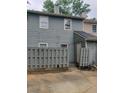 Fenced backyard with access door, showcasing a private outdoor space perfect for relaxation or entertainment at 3500 Ten Oaks Ct, Powder Springs, GA 30127