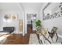 Elegant entryway boasting hardwood floors, stylish decor, and a welcoming ambiance at 468 Lake Ridge Ln, Fairburn, GA 30213