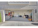 Spacious two-car garage, perfect for storage and vehicles at 104 Auburn Crossing Way, Auburn, GA 30011