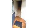 Inviting entryway with hardwood floors and staircase leading to the upper level at 3263 Mill Springs Circle Northeast Cir, Buford, GA 30519
