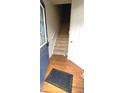 Entryway featuring stairs, hardwood floors, and a welcoming front door, ready for personalization at 3263 Mill Springs Circle Northeast Cir, Buford, GA 30519