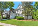 Beautiful two-story home featuring an attached garage, a well-maintained lawn, and lush landscaping at 2907 Timbercreek Cir, Roswell, GA 30076