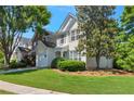 A pleasing view of the home's front exterior on a sunny day, showing lawn and landscaping at 2907 Timbercreek Cir, Roswell, GA 30076