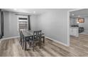 Dining area features modern flooring, a stylish table set, and neutral wall paint at 2903 Monterey Dr, Decatur, GA 30032