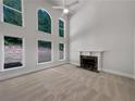 Bright living room with fireplace, high ceilings, and plenty of natural light at 3832 Cherry Ridge Blvd, Decatur, GA 30034