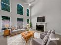 Bright living room with fireplace, high ceilings, and plenty of natural light at 3832 Cherry Ridge Blvd, Decatur, GA 30034