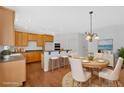 Cozy kitchen with breakfast bar, seating, and ample cabinet space, perfect for entertaining and casual dining at 2372 Oberon Se Walk, Smyrna, GA 30080