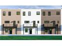 Back of modern townhomes featuring balconies and doors at 343 Sugarview Rd, Sugar Hill, GA 30518