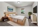 Serene bedroom with neutral tones, a comfortable bed, and modern decor at 20 Shadow Creek Dr, Villa Rica, GA 30180