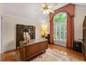 Charming office space with a large window, hardwood floors, and stylish accents at 312 Crabapple Springs Way, Woodstock, GA 30188