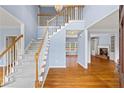 Bright foyer with staircase and hardwood floors at 1850 Mallard Lake Dr, Marietta, GA 30068