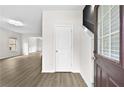 Inviting foyer with new floors leads into the bright living space of the home at 3340 Ivey Rdg, Buford, GA 30519