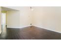 Dining room with hardwood floors and natural light. Ready for dinner at 5867 Trent Walk Dr, Lithonia, GA 30038