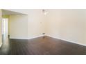 Dining room featuring sleek hardwood floors and ample natural light at 5867 Trent Walk Dr, Lithonia, GA 30038