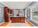 Spacious office with custom built-ins, hardwood floors, and lots of natural light at 4648 Equestrian Way, Atlanta, GA 30338