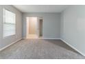 Neutral bedroom with carpet flooring, closet, and window at , Lithonia, GA 30038