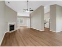 Spacious living room with fireplace, high ceilings and wood floors at 1011 Riverclift Dr, Covington, GA 30016