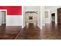Spacious living room showcasing hardwood floors, wainscoting, and bright light at 90 Alcovy Reserve Way, Covington, GA 30014