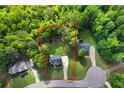 Aerial view outlining this property's location within a lush wooded area at 71 Headland Ct, Rockmart, GA 30153