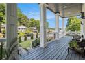 Inviting front porch with comfortable seating and views of a beautifully landscaped yard at 918 Washington Sw St, Atlanta, GA 30315