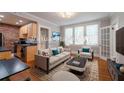 Bright living room with modern furnishings and an open layout to the kitchen at 733 Frederica Ne St # 17, Atlanta, GA 30306