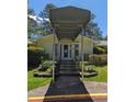 The front entrance of this building features a covered entry and manicured landscaping at 395 Russell Sw Dr, Smyrna, GA 30082