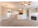 Comfortable living room showcasing a fireplace, ample space, and neutral color palette at 4544 Parkview Sq, Atlanta, GA 30349