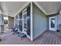 Cozy covered porch with rocking chairs offers a relaxing outdoor space at 106 Twilight Overlook, Canton, GA 30114