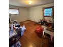 Bedroom featuring wood floors and a sunlit window at 3838 Dunbury Ln, Decatur, GA 30032