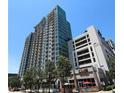Modern high-rise apartment building featuring shops at street level and convenient parking garage access at 250 Pharr Ne Rd # 208, Atlanta, GA 30305
