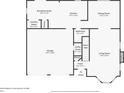 Layout of floor 1 featuring a kitchen, dining room, living room, laundry room, and garage at 4400 Old Allgood Cir, Stone Mountain, GA 30083