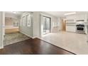 Bright kitchen featuring modern appliances, white cabinetry, and a seamless flow to the living spaces, offering an open concept design at 2041 Kramer Way, Marietta, GA 30062