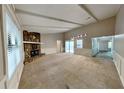Spacious living room featuring a stone fireplace and neutral carpet at 2041 Kramer Way, Marietta, GA 30062