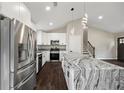 Modern kitchen with white cabinetry, granite countertops, stainless steel appliances, and a large island at 2872 Estuary Dr, Acworth, GA 30101