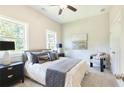 Cozy bedroom featuring a comfortable bed and natural light at 3810 Jack Vernon Cir, Powder Springs, GA 30127
