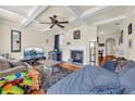 Comfortable living room with coffered ceilings, a cozy fireplace, and ample seating for Gathering and guests at 2677 Sardis Chase Ct, Buford, GA 30519