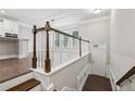 View from stairs to kitchen and main floor entry at 1036 Grant Park Rd, Decatur, GA 30033