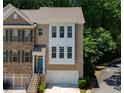Inviting brick townhome with two-car garage at 1036 Grant Park Rd, Decatur, GA 30033