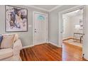 Inviting foyer featuring hardwood floors and a view into the adjacent room at 1311 Sylvan Cir, Brookhaven, GA 30319