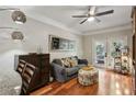 Cozy living room featuring hardwood floors and a ceiling fan at 2700 Pine Tree Rd # 3006, Atlanta, GA 30324
