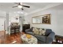 Open-concept living room with modern decor and abundant natural light at 2700 Pine Tree Rd # 3006, Atlanta, GA 30324