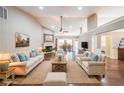 Spacious living room featuring hardwood floors, fireplace, and ample seating, perfect for entertaining guests or relaxing with Gathering at 1382 Fountain Lakes Drive Dr, Lawrenceville, GA 30043