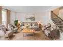 Cozy living room featuring neutral tones, plush seating, and elegant decor, perfect for relaxation and entertaining at 3210 Quincetree Lane Ln, Decatur, GA 30034