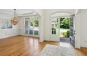 Inviting entryway featuring hardwood floors, neutral walls, and an open view of the front yard at 5059 Belair Bluff Se Ct, Smyrna, GA 30126