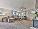 Spacious living room featuring a neutral color palette and plenty of natural light at 543 S Holly Springs Rd, Woodstock, GA 30188