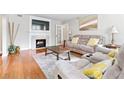 Cozy living room with fireplace, hardwood floors, and comfortable seating at 1359 Scott Blvd, Decatur, GA 30030