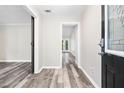 Inviting foyer with modern wood flooring and neutral paint at 4274 Timber Trace Road, Loganville, GA 30052